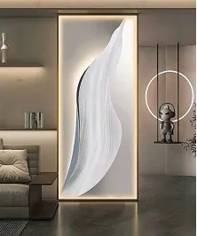 The Gray Panel With The Golden Frame Has Elegant Lighting
